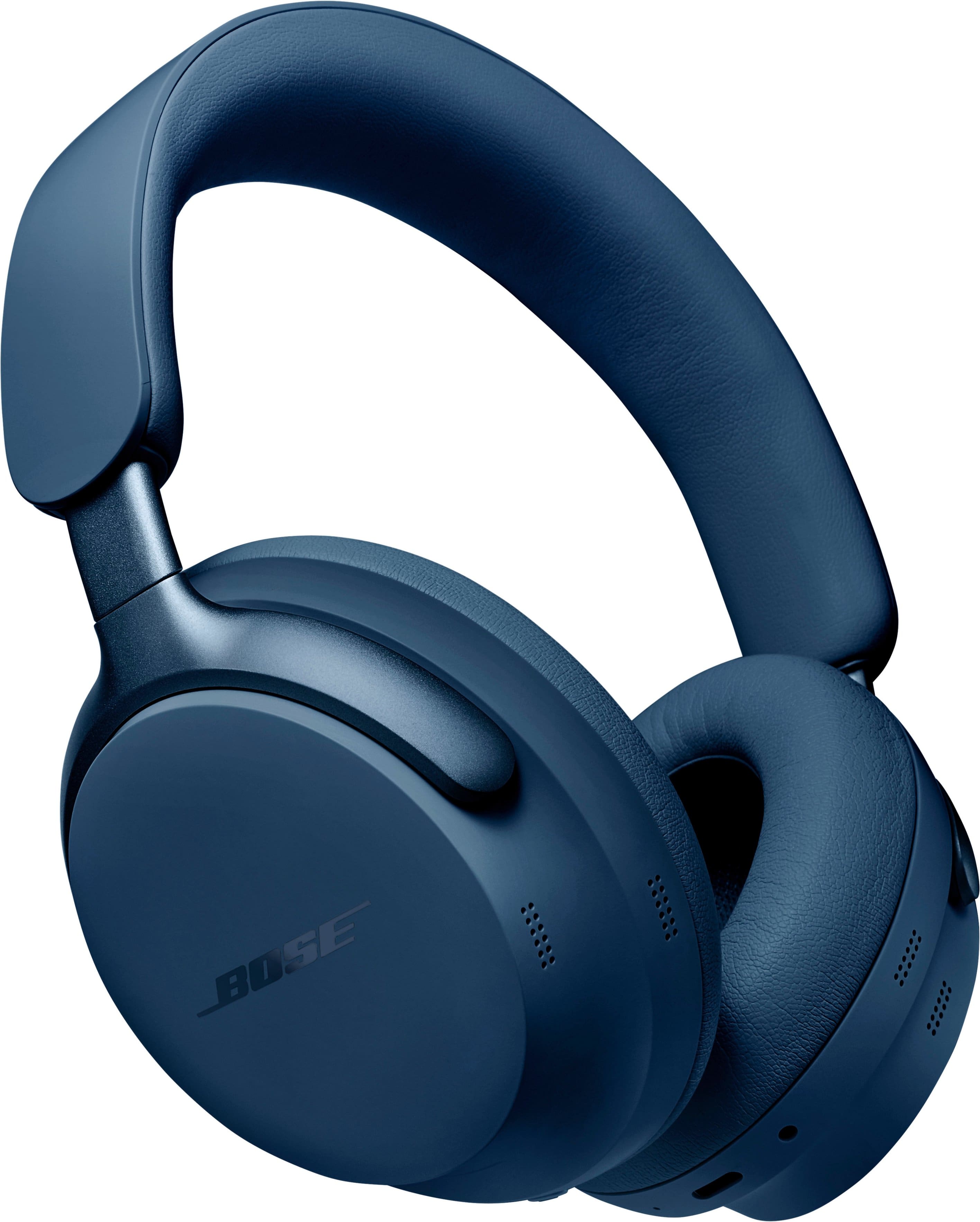 Bose QuietComfort Ultra Headphones in Lunar Blue color on a desk